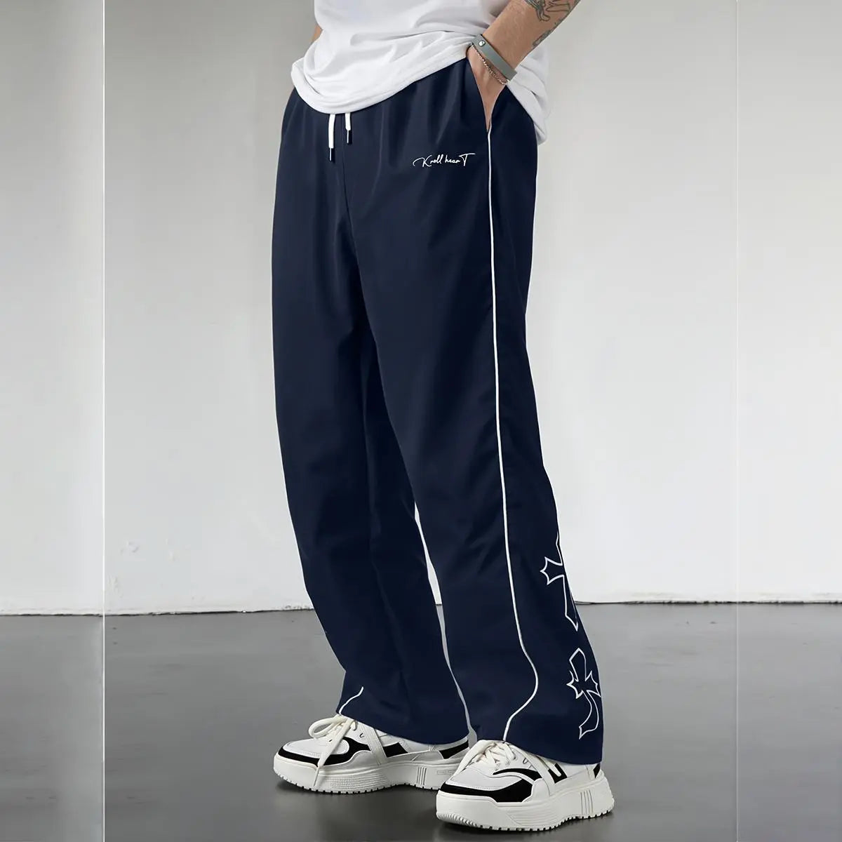 Elevate Your Style with Men's Summer Loose Sports Pants - Lightweight, Comfortable, and Stylish Gray Trousers with Gold Accents