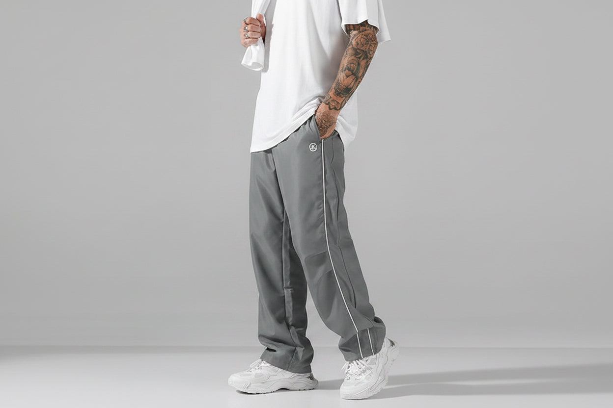 Elevate Your Style with Men's Summer Loose Sports Pants - Lightweight, Comfortable, and Stylish Gray Trousers with Gold Accents